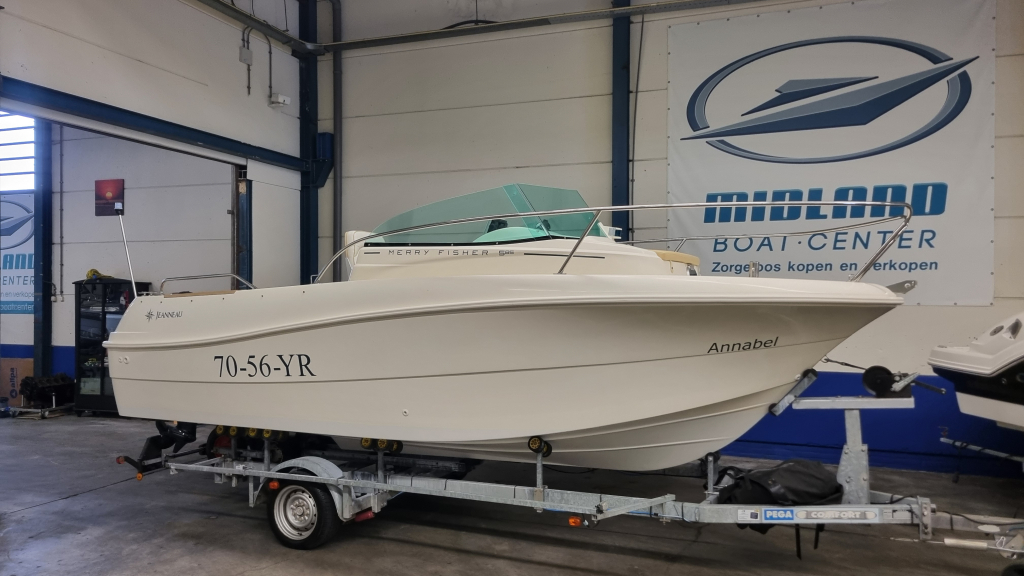 Jeanneau Merry Fisher 585 met Suzuki DF90A en trailer — foto 1 van 19