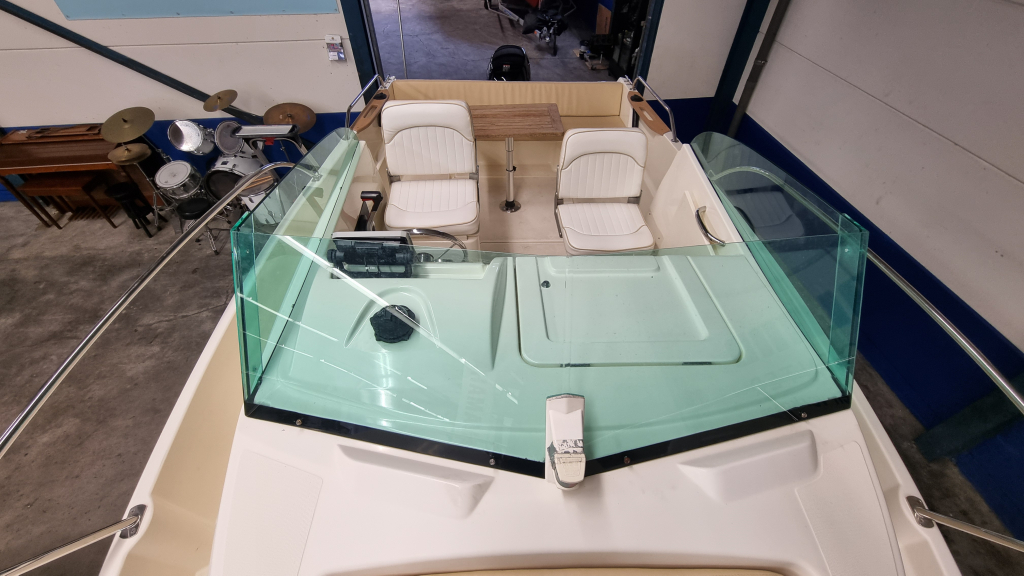 Jeanneau Merry Fisher 585 met Suzuki DF90A en trailer — foto 13 van 19