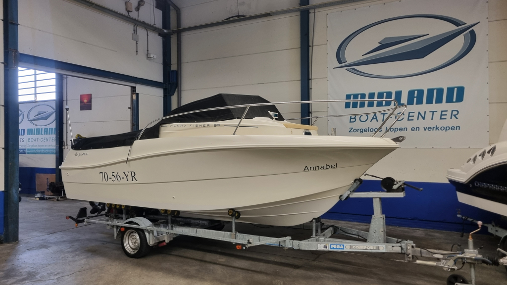 Jeanneau Merry Fisher 585 met Suzuki DF90A en trailer — foto 2 van 19