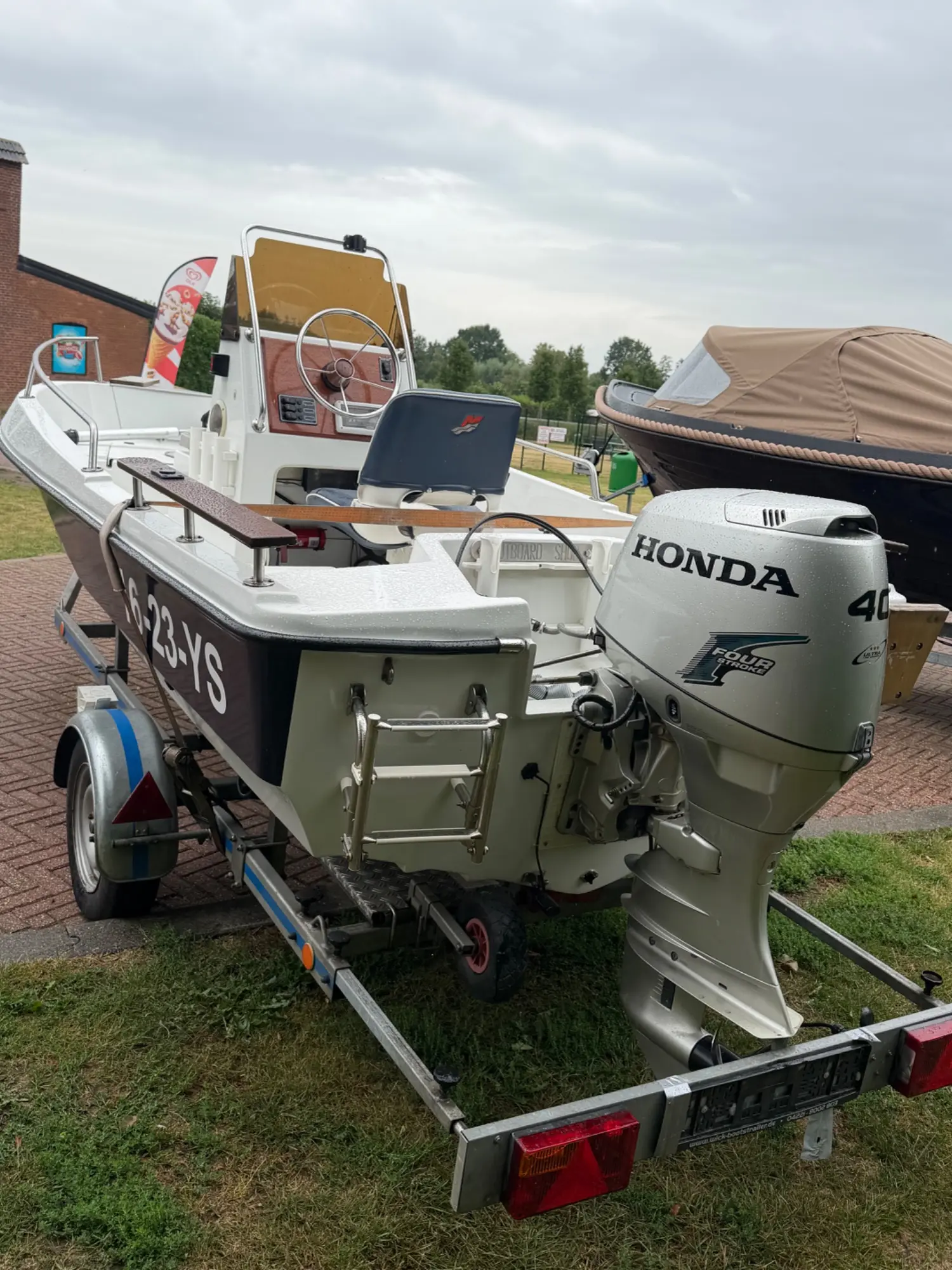 Elan 450 Inc Honda 40pk en trailer in nieuwstaat — foto 6 van 15