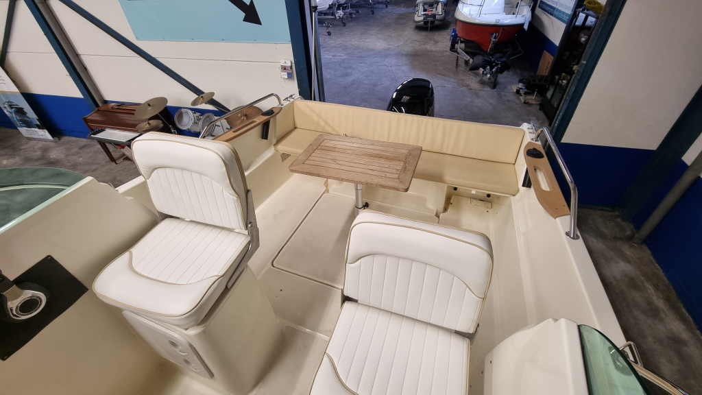Jeanneau Merry Fisher 585 met Suzuki DF90A en trailer — foto 10 van 19